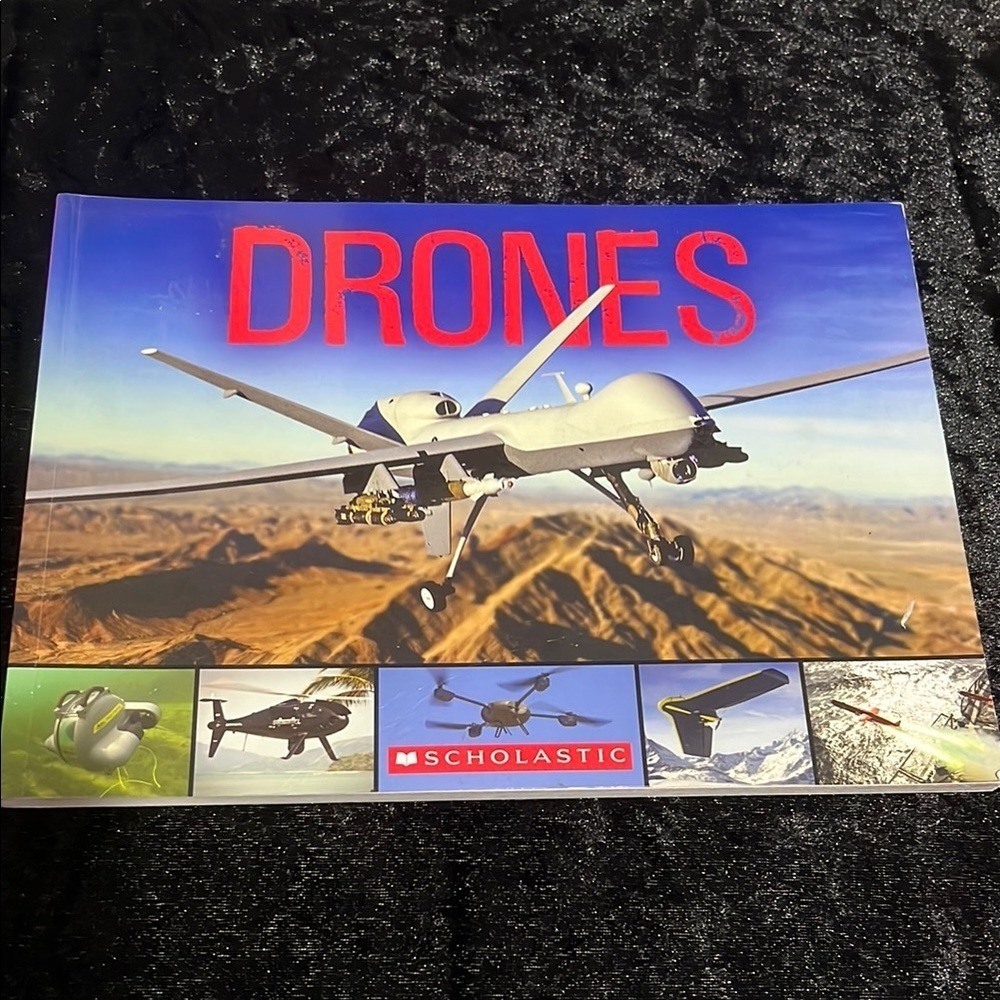 Scholastic DRONES Book with Red and Blue Cover $7